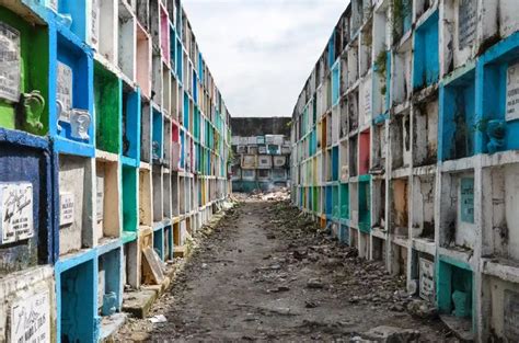 cemetery scandal.com|Graveyard living: inside the 'cemetery slums' of Manila.